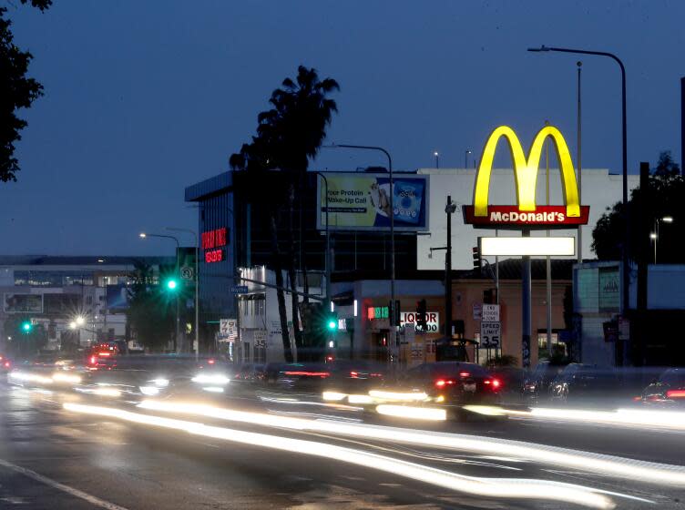 Van Nuys, CA - April 24: Traffic streams through the intersection of Van Nuys Boulevard and Blythe Street in Van Nuys on Monday, April 25, 2023. Four members of the Blythe Street gang are on trial on charges of conspiracy and murder, one of which happened near this location. (Luis Sinco / Los Angeles Times)