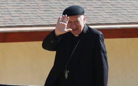 FILE PHOTO: Archbishop of Santiago, Ricardo Ezzati waves to the media during a meeting of the Chile's Episcopal Conference in Punta de Tralca, Chile August 3, 2018. REUTERS/Rodrigo Garrido
