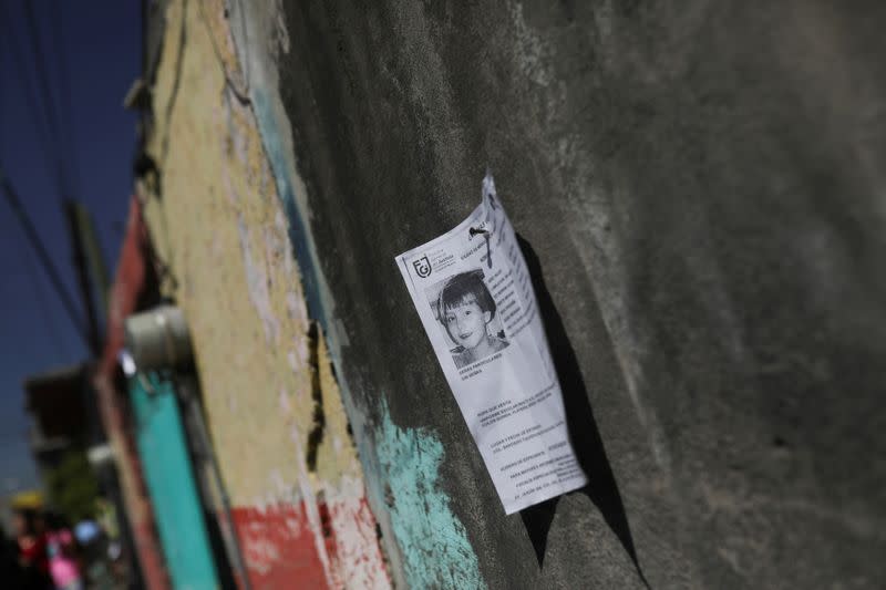 People arrive at the home of seven-year-old Fatima Cecilia Aldrighett, who went missing on February 11 and whose body was discovered over the weekend inside a plastic garbage bag, in Mexico City