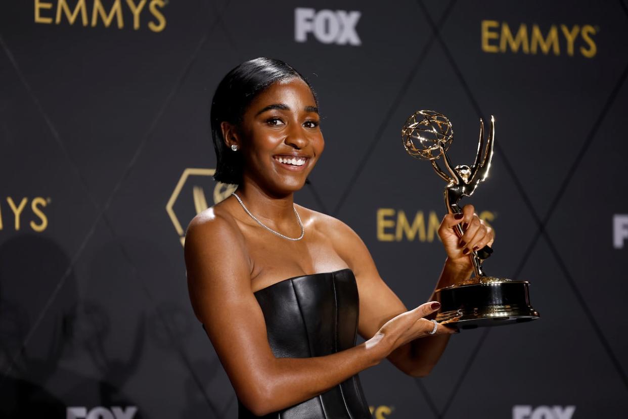 Ayo Edebiri, winner of the Outstanding Supporting Actress in a Comedy Series award for The Bear, poses in the press room during the 75th Primetime Emmy Awards. (Getty Images - image credit)