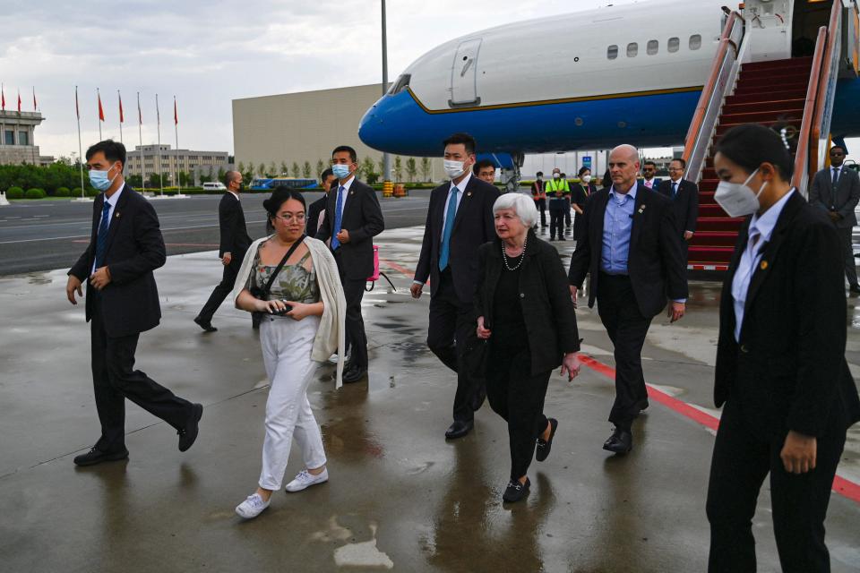 US Treasury Secretary Janet Yellen (3rd R) arrives at Beijing Capital International Airport in Beijing on July 6, 2023.  / Credit: PEDRO PARDO/POOL/AFP via Getty Images