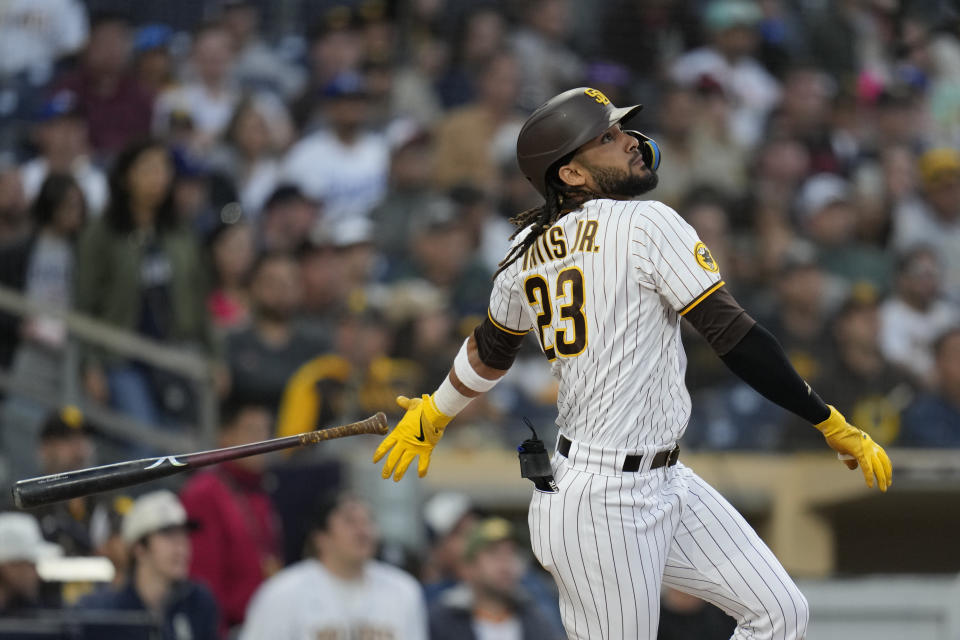 San Diego Padres' Fernando Tatis Jr. watches his fly out during the third inning of a baseball game against the Kansas City Royals, Tuesday, May 16, 2023, in San Diego. (AP Photo/Gregory Bull)