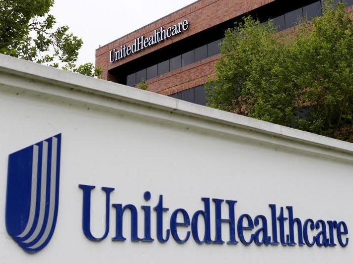 FILE PHOTO - The logo of Down Jones Industrial Average stock market index listed company UnitedHealthcare is shown in Cypress, California April 13, 2016.  REUTERS/Mike Blake/File Photo - RTSVXHS