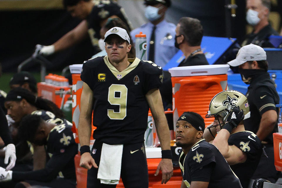 Drew Brees reportedly may miss extended playing time with a couple different injuries. (Photo by Chris Graythen/Getty Images)