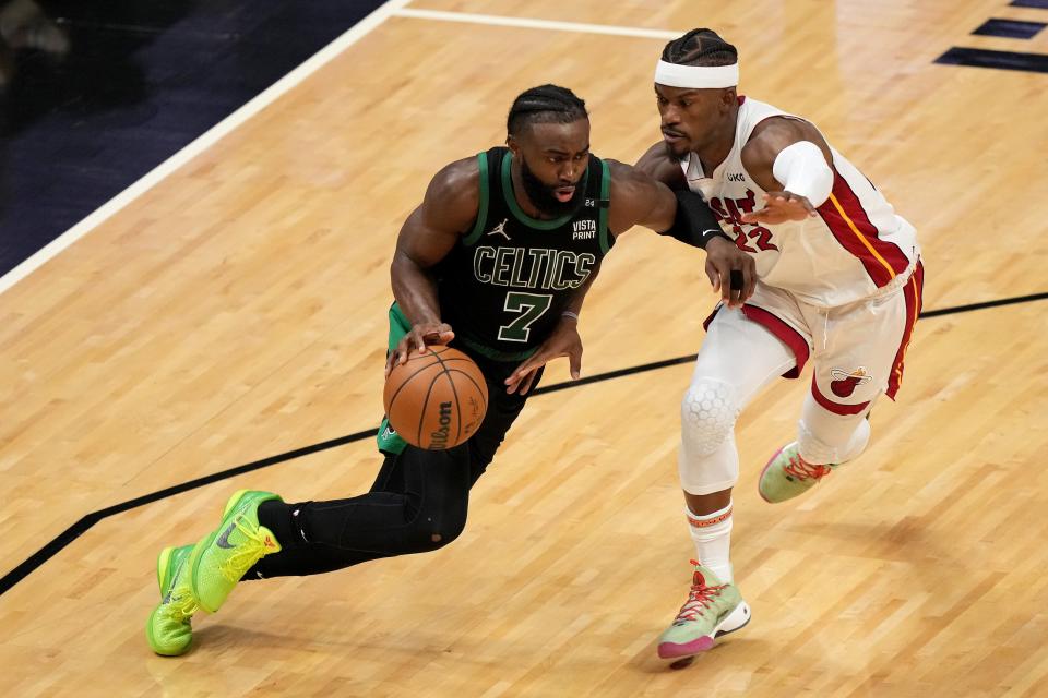 Jimmy Butler (22) and the Heat have had trouble keeping up with Jaylen Brown (7) and the Celtics.