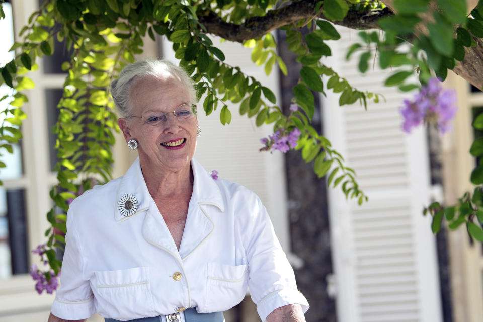 Denmark's Queen Margrethe arrives for a press conference at the in her Chateau de Caix residence near Cahors, southwestern France, Thursday, Aug.16, 2018. In her first public comments since Henrik died Feb. 13 at age 83, Margrethe says "it's healthy to be busy," adding "things go pretty well." (AP Photo/Fred Lancelot)