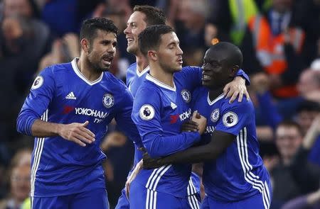 Britain Soccer Football - Chelsea v Manchester United - Premier League - Stamford Bridge - 23/10/16 Chelsea's N'Golo Kante celebrates scoring their fourth goal with team mates Reuters / Eddie Keogh Livepic