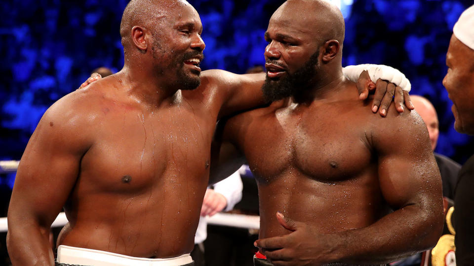 Carlos Takam (right) and Dereck Chisora after their WBA International heavyweight title at the O2 Arena, London. (Photo by Nick Potts/PA Images via Getty Images)