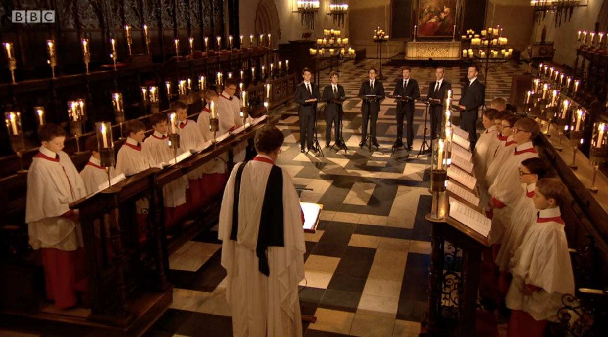 The choir performed inside an empty church on Christmas Eve. (BBC)