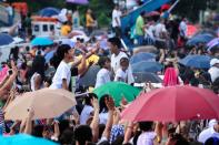 A sea of people gather to see the annual Metro Manila Film Festival Parade of Stars. (Angela Galia/NPPA Images)