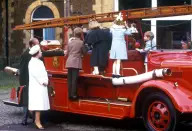 <p>Queen Elizabeth and Prince Philip, along with their grandchildren Prince Harry, Peter Phillips, Zara Phillips, Prince William, and Prince Harry, took in a 1939 Merryweather Fire Engine at the Sandringham Museum. </p>