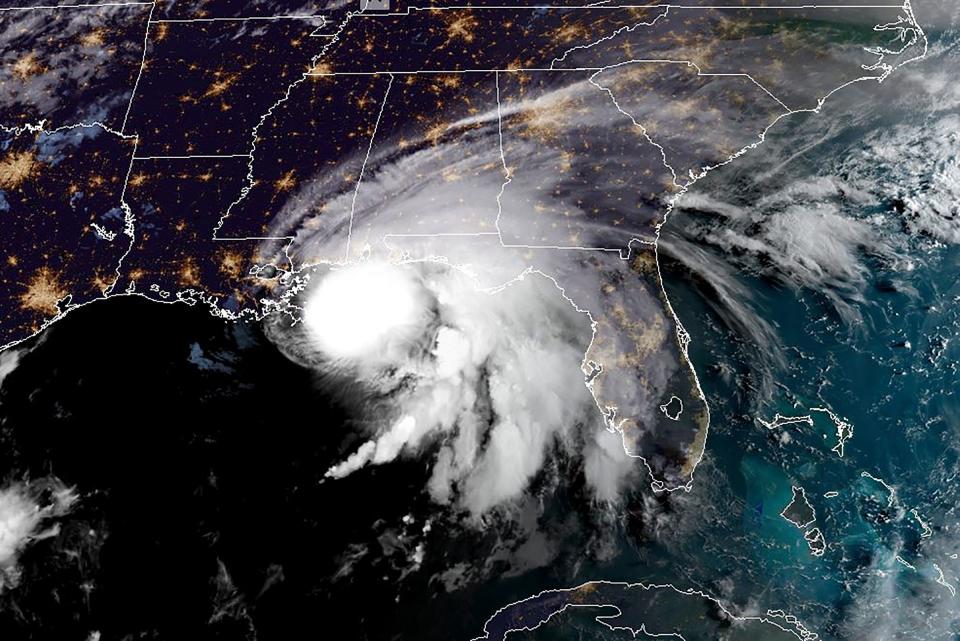 A satellite image from RAMMB/NOAA shows Hurricane Sally entering the US Gulf Coast on 15 September.RAMMB/NOAA/NESDIS/AFP via Getty