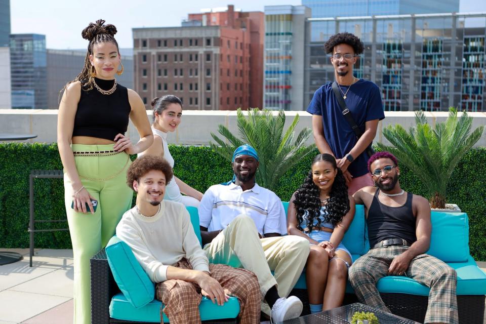 Oklahoma City writer-director Benjamin Tefera, standing at right, poses with the principal cast of his upcoming movie "Defiant Vanity" during filming on the rooftop of the Oklahoma City Museum of Art.