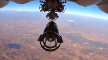 A video grab made on October 6, 2015 from footage on the Russian Defence Ministry's official website purports to show a Russia's Su-24M bomber dropping bombs during an airstrike in Syria