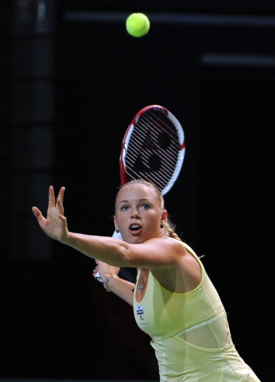 Caroline Wozniacki of Denmark hits a return to Agnieszka Radwanska of Poland during their WTA tennis championships match in Istanbul on October 25, 2011. AFP PHOTO/BULENT KILIC (Photo credit should read BULENT KILIC/AFP/Getty Images)