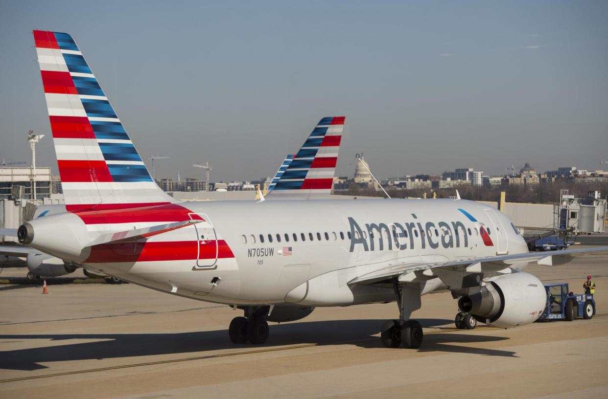 At least 12 passgengers on an two American Airlines flights arriving from Germany and France in Philadelphia International Airport have reported flu-like symptoms: SAUL LOEB/AFP/Getty Images