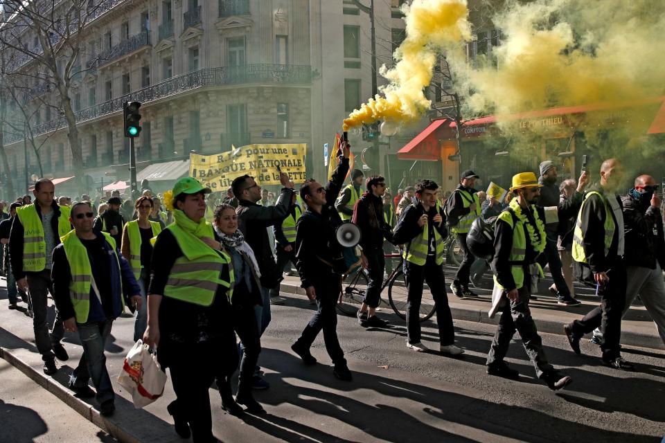 Protesters took to the streets with banners amid efforts to keep the gatherings peaceful (EPA)