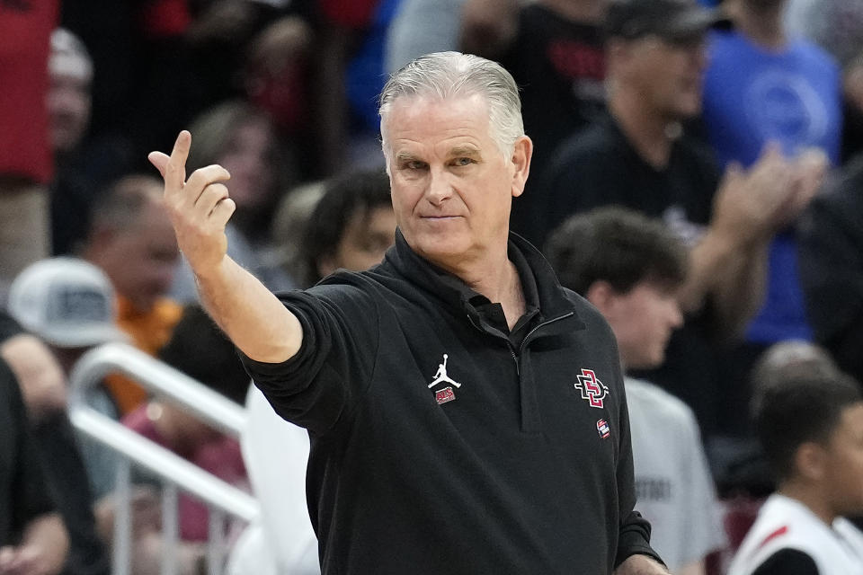 San Diego State head coach Brian Dutcher calls a play against Furman during the second half of a second-round college basketball game in the NCAA Tournament Saturday, March 18, 2023, in Orlando, Fla. (AP Photo/Chris O'Meara)