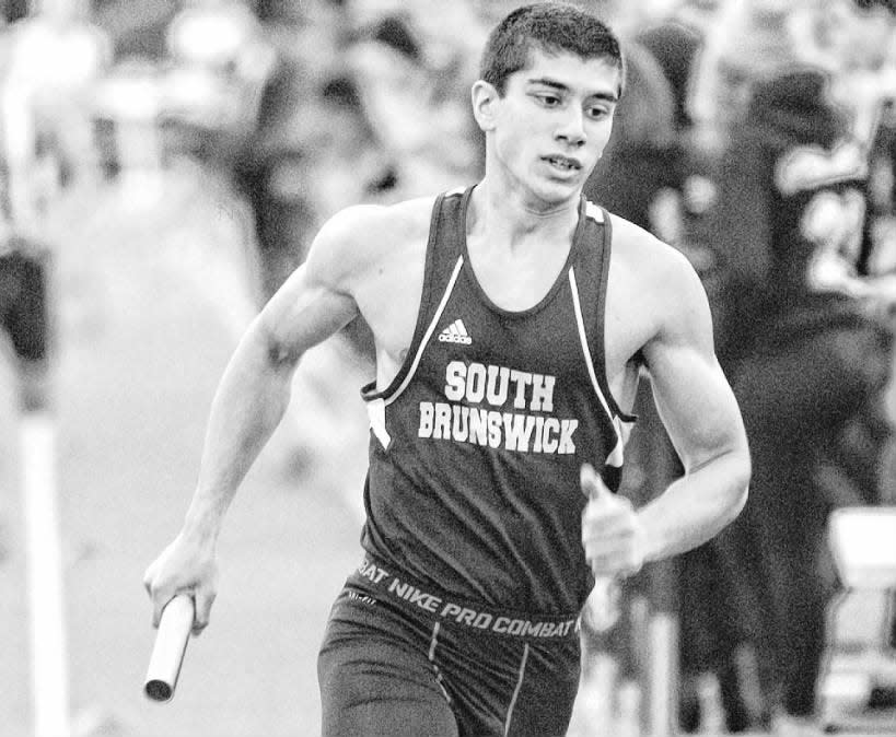 Morgan Murray of South Brunswick runs the 1200 leg of the distance medley on Sunday, Jan. 5, 2014, at the GMC Relays in Toms River.