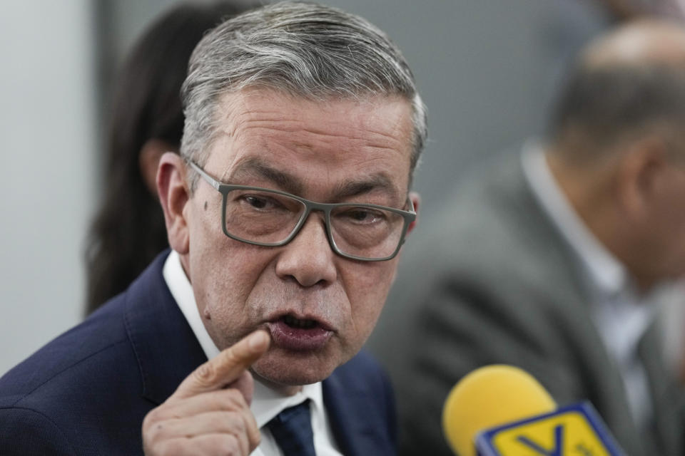 Gerardo Blyde, a leader in the opposition's delegation of the unitary platform for negotiation, speaks to the press in Caracas, Venezuela, Monday, Feb. 19, 2024. (AP Photo/Ariana Cubillos)