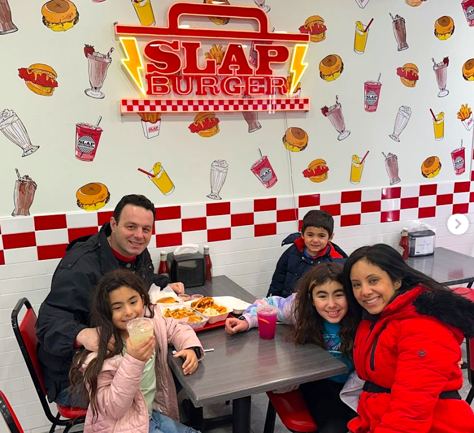 Paterson Mayor Andre Sayegh and family enjoy a meal at recently opened Slap Burger.