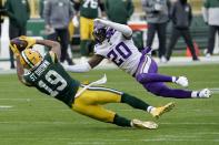 Green Bay Packers' Equanimeous St. Brown can't catch a pass with Minnesota Vikings' Jeff Gladney defending during the second half of an NFL football game Sunday, Nov. 1, 2020, in Green Bay, Wis. (AP Photo/Morry Gash)