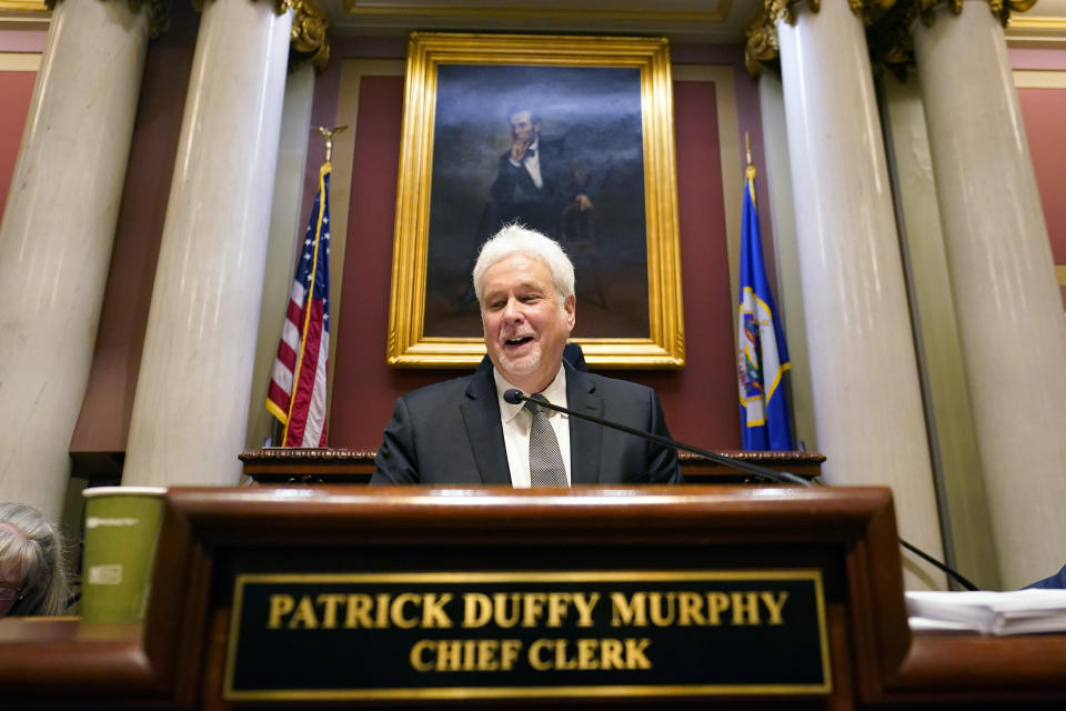 Chief Clerk Patrick Duffy Murphy addresses the House floor after being re-elected as Chief Clerk during the first day of the 2023 legislative session, Tuesday, Jan. 3, 2023, in St. Paul, Minn. (AP Photo/Abbie Parr)