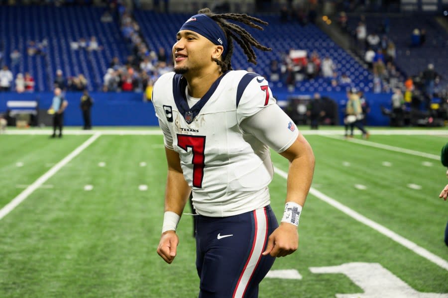 Houston Texans quarterback C.J. Stroud (7) runs off the field after an NFL football game against the Indianapolis Colts, Saturday, Jan. 6, 2024, in Indianapolis. (AP Photo/Zach Bolinger)