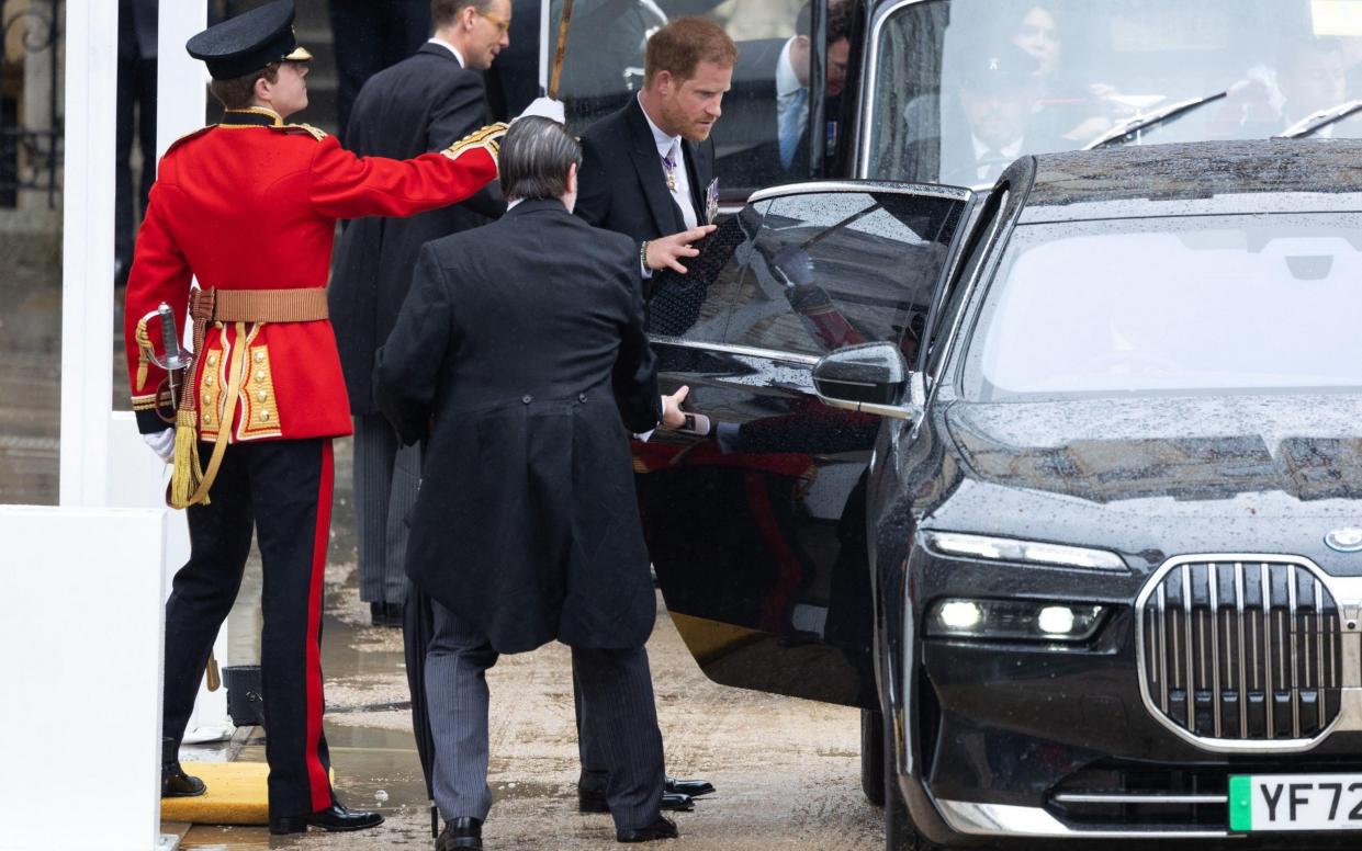 Prince Harry leaving the Coronation ceremony at Westminster Abbey to return to California - Abaca Press / Alamy Live News