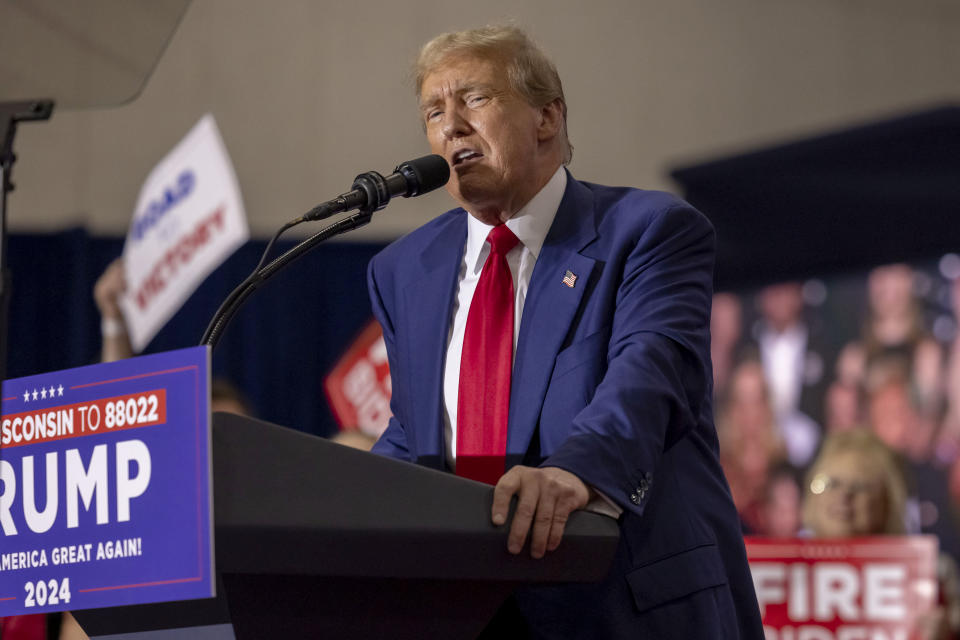 FILE - Republican presidential candidate former President Donald Trump speaks April 2, 2024, at a rally in Green Bay, Wis. A new poll from The Associated Press-NORC Center for Public Opinion Research conducted March 21-25, finds that while Americans say they respect the Constitution's checks and balances and don't want a president to have too much power, that view shifts if the candidate of their party wins the presidency. It’s a view held by members of both parties, though it's especially common among Republicans. (AP Photo/Mike Roemer, File)