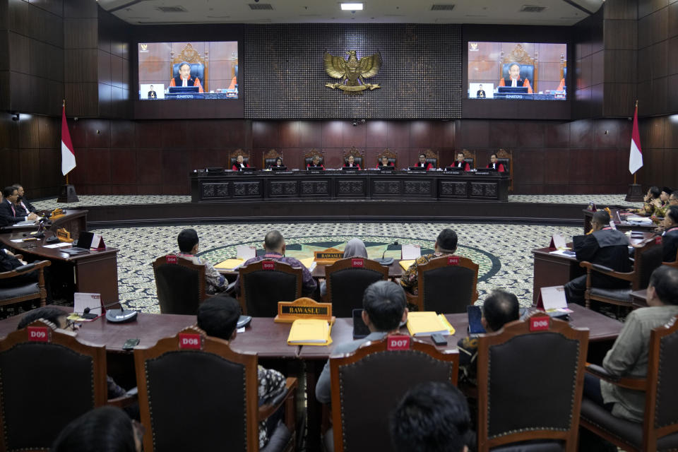 Judges preside over the election appeal hearing at the Constitutional Court in Jakarta, Indonesia, Monday, April 22, 2024. The country's top court on Monday rejected appeals lodged by two losing presidential candidates who are demanding a revote, alleging widespread irregularities and fraud at the February polls. (AP Photo/Dita Alangkara)