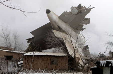 Plane debris is seen at the crash site of a Turkish cargo jet near Kyrgyzstan's Manas airport outside Bishkek, Kyrgyzstan January 16, 2017. REUTERS/Vladimir Pirogov/File Photo