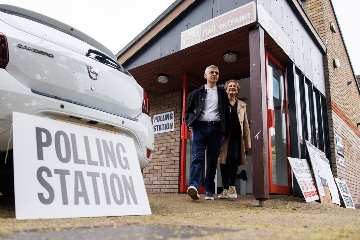 Mayor of London Sadiq Khan and his wife Saadiya Khan leave their polling station (EPA)