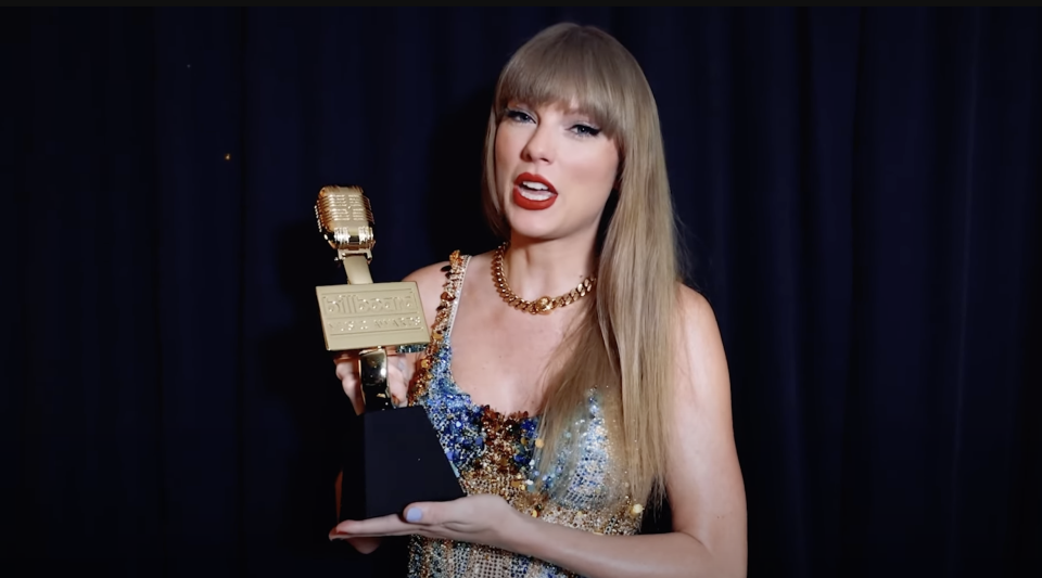 Taylor Swift accepts her 2023 Billboard Music Award for Top Artist during one of the awkward night's pre-taped speeches. (YouTube)