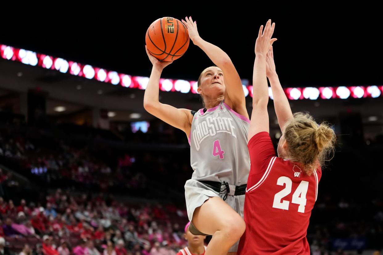 Feb 1, 2024; Columbus, OH, USA; Ohio State Buckeyes guard Jacy Sheldon (4) shoots over Wisconsin Badgers guard Natalie Leuzinger (24) during the second half of the NCAA women’s basketball game at Value City Arena. Ohio State won 87-49.