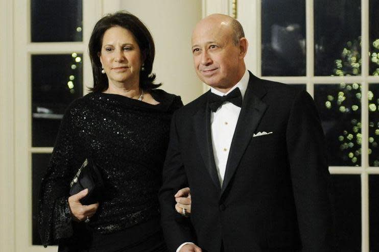 Lloyd Blankfein and his wife Laura Blankfein arrive for the state dinner hosted by President Obama and first lady Michelle Obama for President of China Hu Jintao at the White House in Washington (REUTERS)