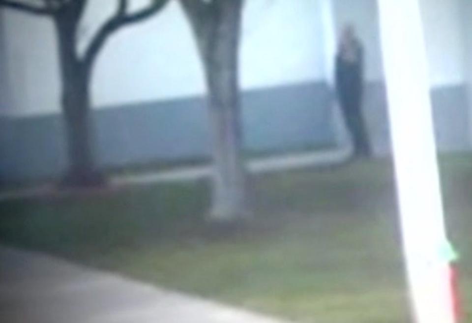 Scot Peterson caught on camera outside the school during the shooting (Broward Sheriff’s Office)