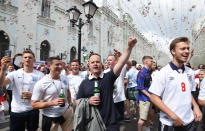 <p>England fans gather in Nikolskaya street near the Red Square in Moscow. </p>