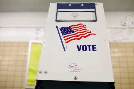 FILE PHOTO: Voting booth is seen as voting opens for the midterm election at P.S. 140 in Manhattan, New York