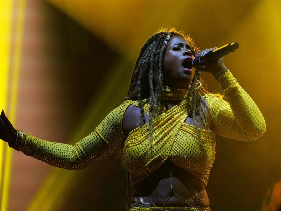 Kelis came to party, dressed in a sparkly yellow two-piece for her first headline show (PA)