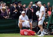 Britain Tennis - Wimbledon - All England Lawn Tennis & Croquet Club, Wimbledon, England - 9/7/16 Canada's Milos Raonic with his coach John McEnroe during a practice session REUTERS/Toby Melville