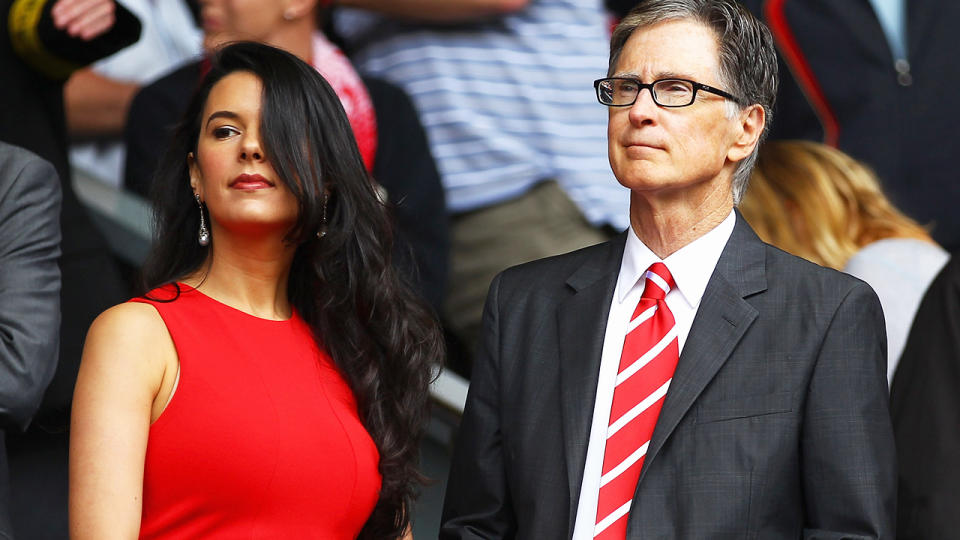 John W Henry, pictured here with wife Linda at a Liverpool game in 2011.