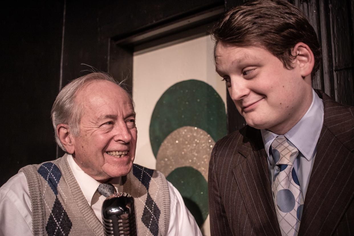 Brian Thomas, left, as Clarence and Adam Gilbert as George Bailey rehearse a scene for Elkhart Civic Theatre’s production of "It’s a Wonderful Life: A Live Radio Play" that runs Dec. 16 to 18, 2022, at the Bristol Opera House.