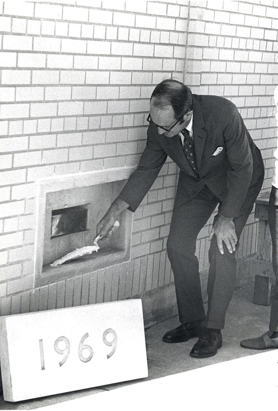 Former Green Bay Press-Gazette Publisher Daniel Beisel lays the cornerstone for the newspaper's new production facility addition at 435 E. Walnut St. in August 1969.