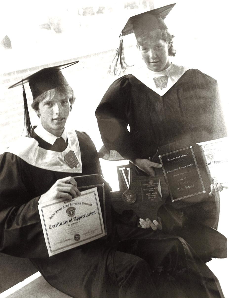 Kim Gidley, right, was the top female athlete at Abilene High as as a senior in 1983, winning the Bev Ball Award. With her was track standout Russell Mangum, a state medalist and class salutatorian. He won the Thornton Award. Both received the Army Reserve Scholar Athlete Award.