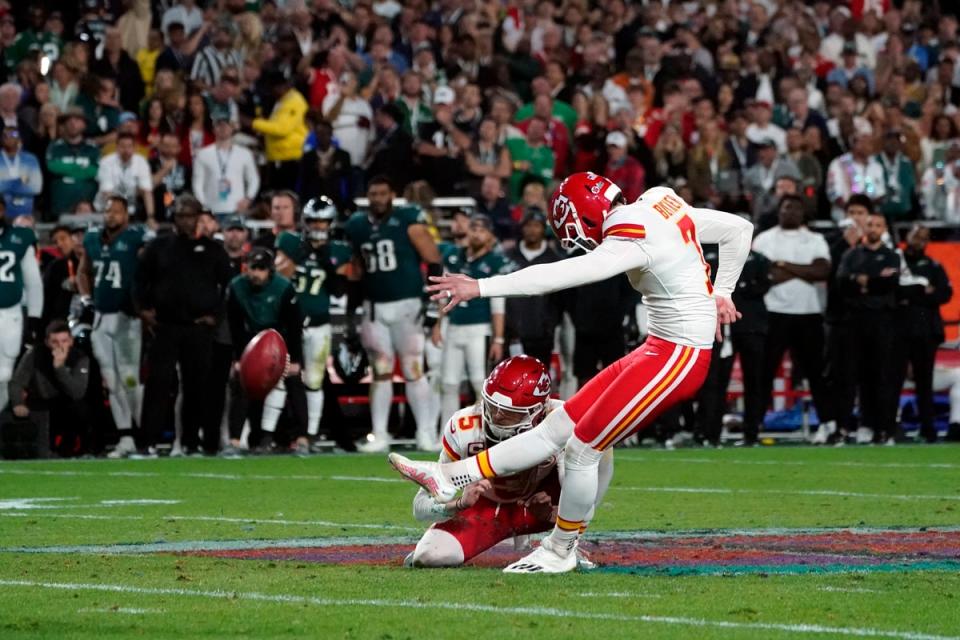 Kansas City Chiefs' kicker Harrison Butker scores the winning points during Super Bowl LVII between the Kansas City Chiefs and the Philadelphia Eagles at State Farm Stadium in Glendale, Arizona, on 12 February 2023. The player has come under fire for remarks he made at a Roman Catholic university earlier this month (AFP via Getty Images)