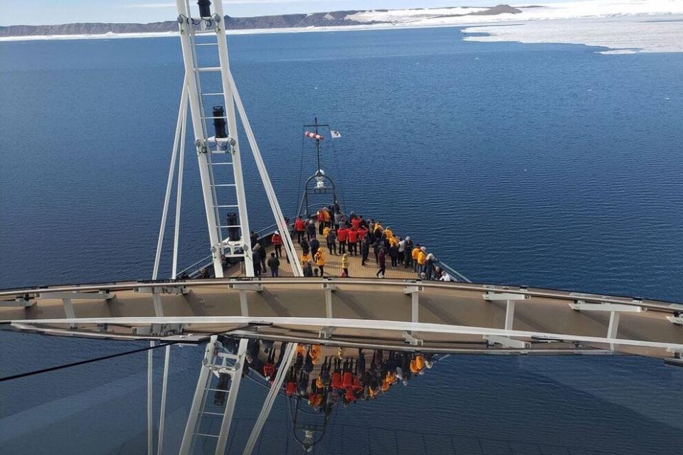 The Seabourn Venture's reflection while cruising through the icy sea