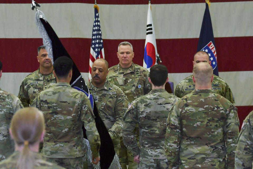 Gen. Paul J. LaCamera, center, commander of the U.S. Forces Korea attends the activation ceremony for the United States Space Forces Korea in Pyeongtaek, South Korea Wednesday, Dec. 14, 2022. U.S. military set up space-monitoring organizations, United States Space Forces Korea, in South Korea, aiming to keep an eye on North Korea's nuclear and missile activity as its capabilities continue to improve. (Song Kyung-Seok/Pool Photo via AP)