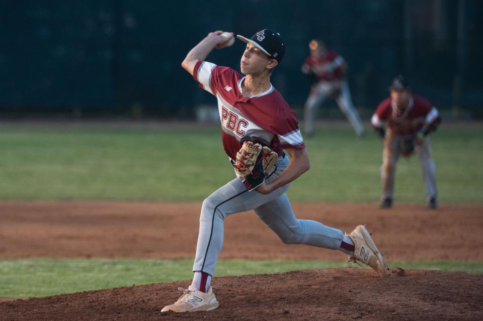 Palm Beach Central pitcher Charlie Houd (4) delivers a pitch at the bottom of the second inning during the District 11-7A championship baseball game between host Jupiter and Palm Beach Central on Thursday, May 4, 2023, in Jupiter, Fla. Final score, Jupiter, 11, Palm Beach Central, 3.