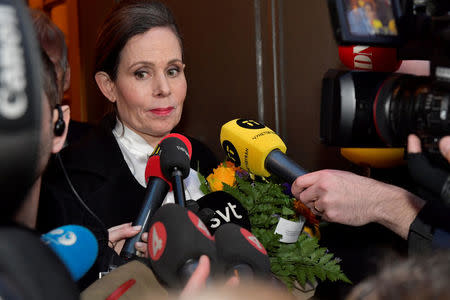 The Swedish Academy's Permanent Secretary Sara Danius talks to the media as she leaves after a meeting at the Swedish Academy in Stockholm, Sweden April 12, 2018. Danius said to journalists that she would leave her position and the Swedish Academy immediately. TT News Agency/Jonas Ekstromer/ via REUTERS